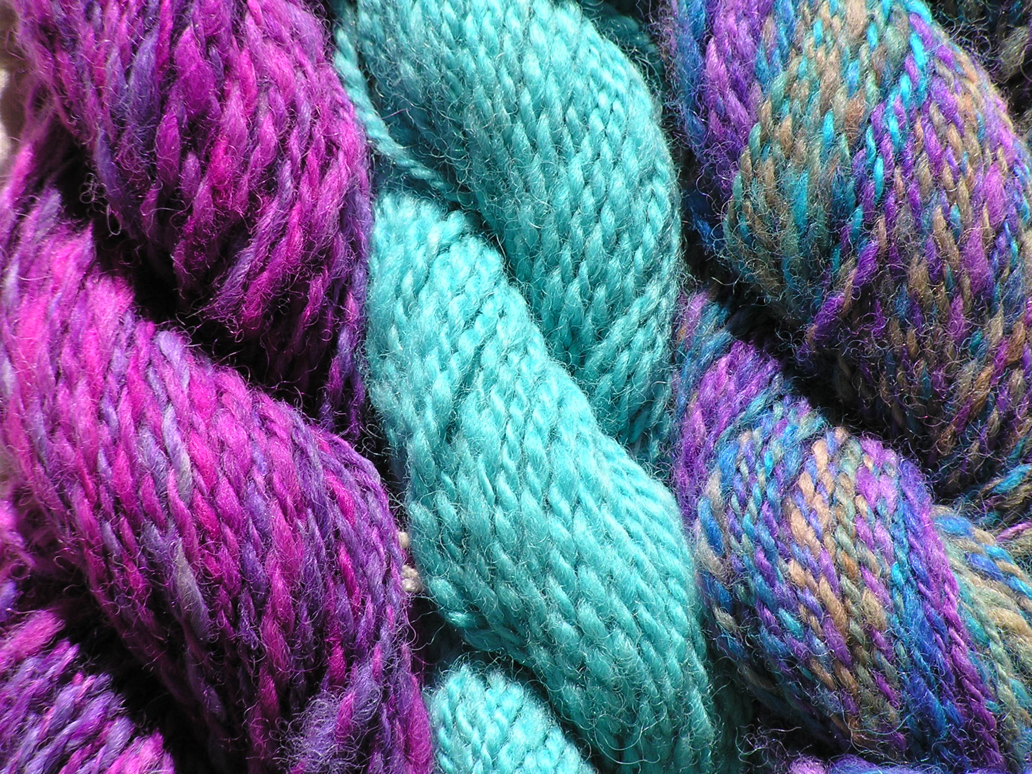 Skeins of dyed handspun yarn